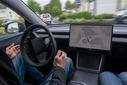 11 May 2026, Rhineland-Palatinate, Bitburg: A self-driving Tesla Model Y is on the road autonomously in Bitburg (Eifel). A factory driver sitting at the wheel intervenes as required in the "Full Self-Driving" (FSD/Supervised) software update, which is not yet approved nationwide. Photo: Harald Tittel/dpa (Photo by Harald Tittel/picture alliance via Getty Images)