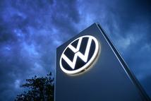 The Volkswagen logo on a stele against a dark sky. Feature, stock photo. (Photo by Frank Hoermann / SVEN SIMON / SVEN SIMON / dpa Picture-Alliance via AFP)