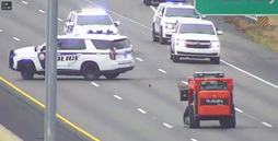 WATCH Interstate tractor chase  WPMI NBC 15.gif