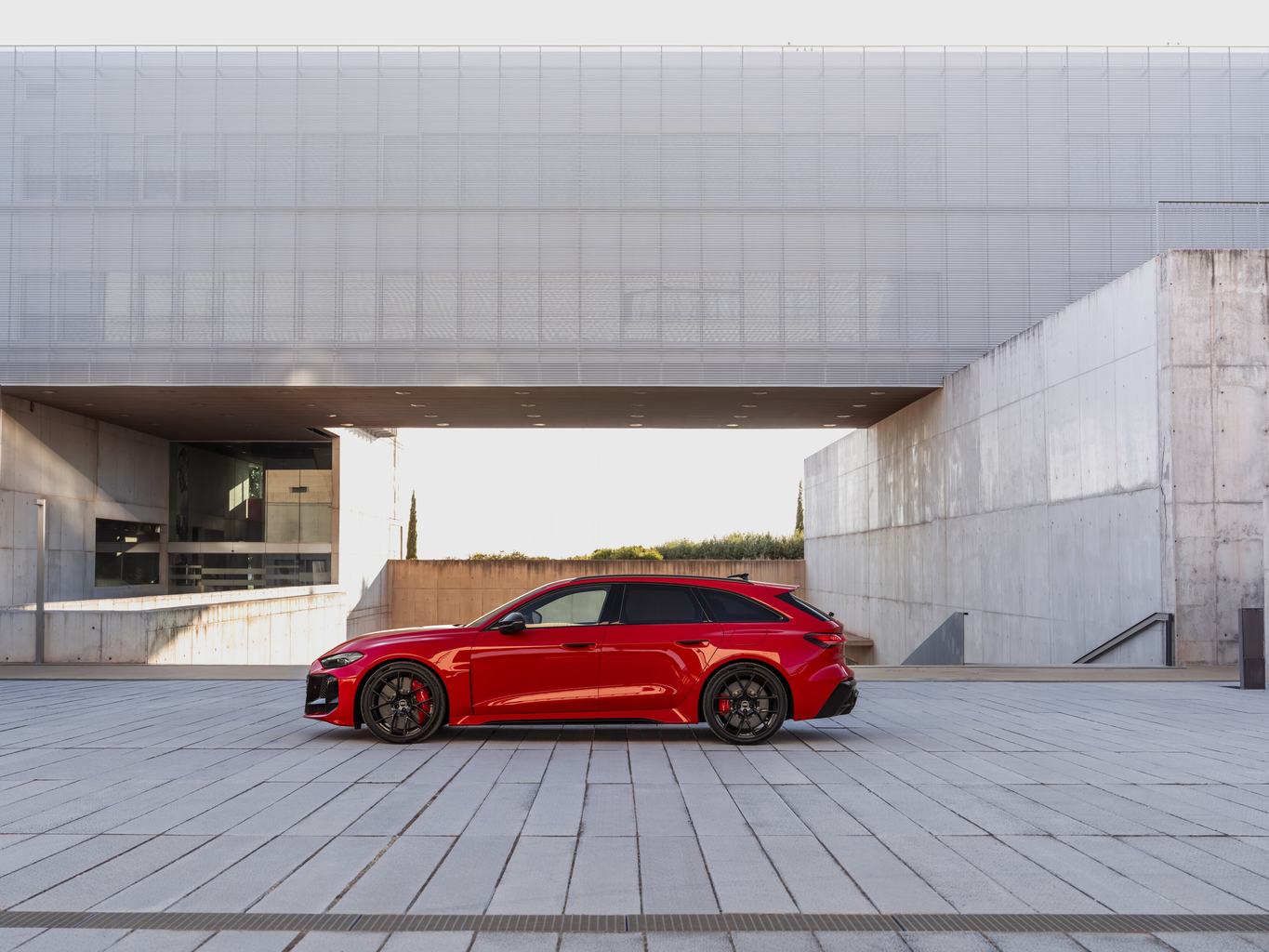 Progressiv red metallic, outdoor static photo, exterior, side view