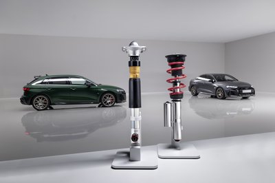 RS 3 Sportback competition limited (Malachite green) and RS 3 Sedan competition limited (Daytona gray pearl effect), indoor static photo, exterior, detailed view of coilover suspension