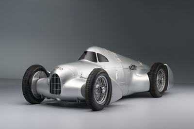 Audi recreated the Auto Union Lucca. After just over three years of construction, the record-breaking car was completed in early 2026. Studio shot of the Avus configuration of the car. Side view.