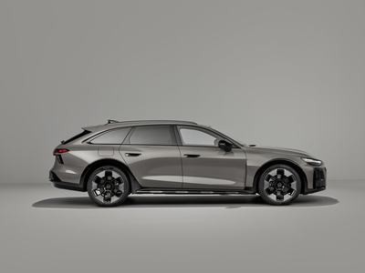 Audi A6 allroad (pearl grey) in a side view: Clean lines, balanced proportions and increased ground clearance define the elegant silhouette with off-road character.