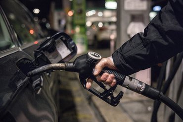 A customer refuels a vehicle at a MOL Hungarian Oil & Gas Plc gas station in Budapest, Hungary, on Monday, Dec. 5, 2022. The countrys biggest oil company, Mol, is struggling to meet demand after its Danube Refinery reduced output for unplanned maintenance just as state price caps drove up fuel consumption. Photographer: Akos Stiller/Bloomberg via Getty Images