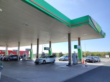 Budapest, Hungary - October 6, 2023: gas station with white MOL sign of Hungarian Oil and Gas Public Limited Company