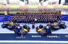 ABU DHABI, UNITED ARAB EMIRATES - DECEMBER 08: Sergio Perez of Mexico and Oracle Red Bull Racing, Hamda Al Qubaisi of United Arab Emirates and Oracle Red Bull Racing and Max Verstappen of the Netherlands and Oracle Red Bull Racing pose for a photo at the Oracle Red Bull Racing team photo prior to the F1 Grand Prix of Abu Dhabi at Yas Marina Circuit on December 08, 2024 in Abu Dhabi, United Arab Emirates. (Photo by Mark Thompson/Getty Images)