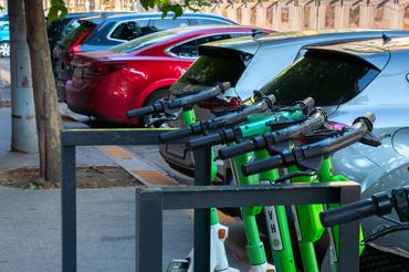 Budapest, Hungary, June 11th, 2025, line of rental electric scooters from "Lime" in Budapest, eastern Europe