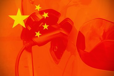 China flags with cars as background, concept of chinese car industry.