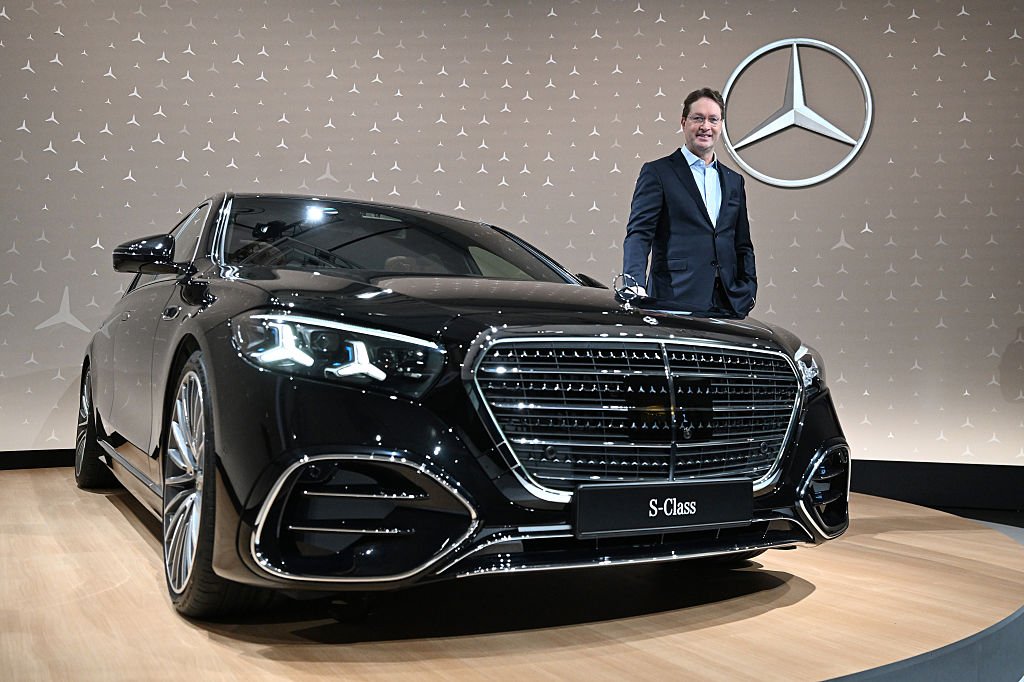 12 February 2026, Baden-Württemberg, Sindelfingen: Ola Källenius, Chairman of the Board of Management of Mercedes-Benz Group AG, stands in front of a Mercedes-Benz brand logo next to a Mercedes-Benz S-Class vehicle before the balance sheet press conference. Photo: Bernd Weißbrod/dpa (Photo by Bernd Weißbrod/picture alliance via Getty Images)