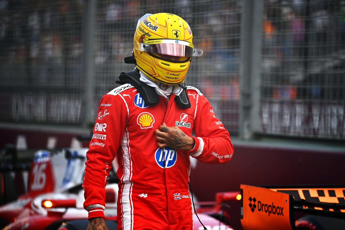 MELBOURNE, AUSTRALIA - MARCH 07: Seventh placed qualifier Lewis Hamilton of Great Britain and Scuderia Ferrari walks in parc ferme during qualifying ahead of the F1 Grand Prix of Australia at Albert Park Grand Prix Circuit on March 07, 2026 in Melbourne, Australia. (Photo by James Sutton - Formula 1/Formula 1 via Getty Images)