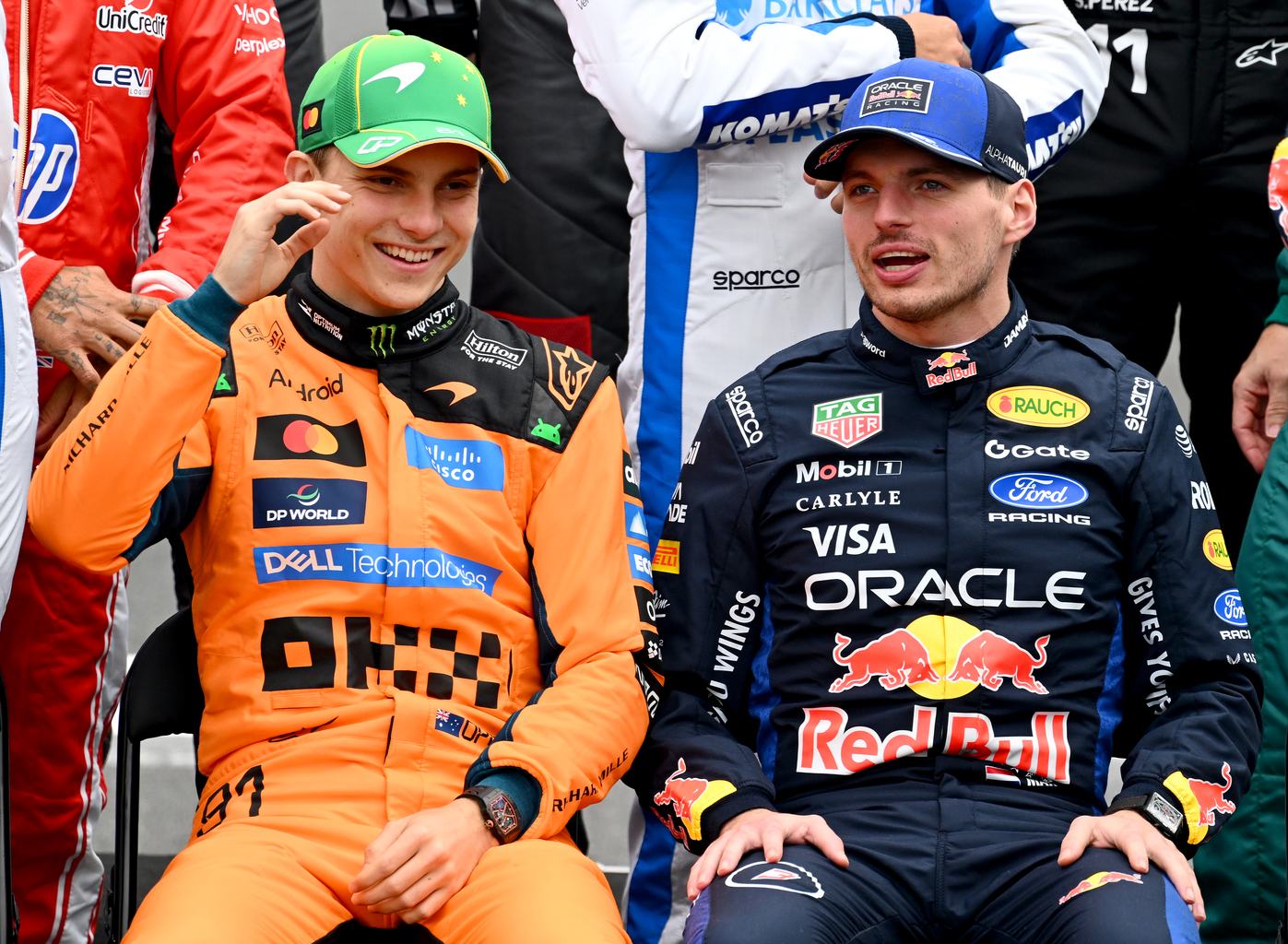 MELBOURNE, AUSTRALIA - MARCH 08: Oscar Piastri of Australia and McLaren and Max Verstappen of the Netherlands and Oracle Red Bull Racing talk on the drivers parade prior to the F1 Grand Prix of Australia at Albert Park Grand Prix Circuit on March 08, 2026 in Melbourne, Australia. (Photo by Mark Sutton - Formula 1/Formula 1 via Getty Images)