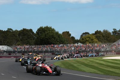 MELBOURNE, AUSTRALIA - MARCH 08: Charles Leclerc of Monaco driving the (16) Scuderia Ferrari SF-26 leads George Russell of Great Britain driving the (63) Mercedes AMG Petronas F1 Team W17 at the start during the F1 Grand Prix of Australia at Albert Park Grand Prix Circuit on March 08, 2026 in Melbourne, Australia. (Photo by Anni Graf - Formula 1/Formula 1 via Getty Images)