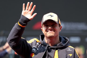 SHANGHAI, CHINA - MARCH 15: Lando Norris of Great Britain and McLaren waves on the drivers parade prior to the F1 Grand Prix of China at Shanghai International Circuit on March 15, 2026 in Shanghai, China. (Photo by Anni Graf - Formula 1/Formula 1 via Getty Images)