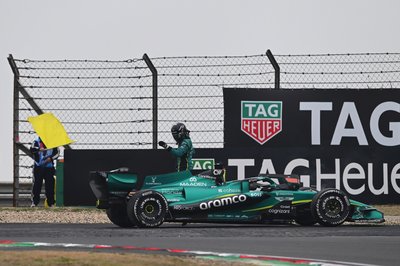 SHANGHAI, CHINA - MARCH 15: Lance Stroll of Canada and Aston Martin F1 Team jumps out of his car after stopping during the F1 Grand Prix of China at Shanghai International Circuit on March 15, 2026 in Shanghai, China. (Photo by Rudy Carezzevoli/Getty Images)