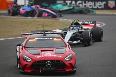 SHANGHAI, CHINA - MARCH 15: The FIA Safety Car leads Andrea Kimi Antonelli of Italy driving the (12) Mercedes AMG Petronas F1 Team W17 on track during the F1 Grand Prix of China at Shanghai International Circuit on March 15, 2026 in Shanghai, China. (Photo by Rudy Carezzevoli/Getty Images)