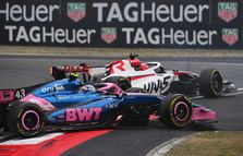 SHANGHAI, CHINA - MARCH 15: Esteban Ocon of France driving the (31) Haas F1 VF-26 Ferrari and Franco Colapinto of Argentina driving the (43) Alpine F1 A526 Mercedes make contact on track during the F1 Grand Prix of China at Shanghai International Circuit on March 15, 2026 in Shanghai, China. (Photo by Rudy Carezzevoli/Getty Images)