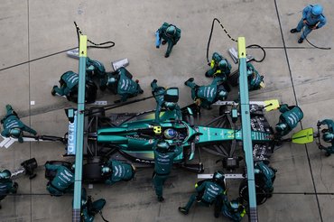 SHANGHAI, CHINA - MARCH 15: Fernando Alonso of Spain driving the (14) Aston Martin F1 Team AMR26 Honda makes a pitstop during the F1 Grand Prix of China at Shanghai International Circuit on March 15, 2026 in Shanghai, China. (Photo by Mark Thompson/Getty Images)