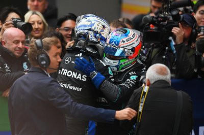 SHANGHAI, CHINA - MARCH 15: Race winner Andrea Kimi Antonelli of Italy and Mercedes AMG Petronas F1 Team and Second placed George Russell of Great Britain and Mercedes AMG Petronas F1 Team celebrate in parc ferme during the F1 Grand Prix of China at Shanghai International Circuit on March 15, 2026 in Shanghai, China. (Photo by Rudy Carezzevoli/Getty Images)