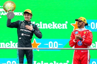SHANGHAI, CHINA - MARCH 15: Race winner Andrea Kimi Antonelli of Italy and Mercedes AMG Petronas F1 Team and Third placed Lewis Hamilton of Great Britain and Scuderia Ferrari on the podium during the F1 Grand Prix of China at Shanghai International Circuit on March 15, 2026 in Shanghai, China. (Photo by Sona Maleterova/Getty Images)