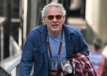 SUZUKA, JAPAN - MARCH 28:  Former Formula 1 World Champion Jacques Villeneuve arrives at the paddock ahead of the qualifying session for the 2026 Japanese Grand Prix at Suzuka Circuit in Suzuka, Mie Prefecture, Japan, on March 28, 2026. (Photo by Artur Widak/NurPhoto via Getty Images)