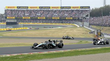 Mercedes' Andrea Kimi Antonelli (front) competes en route to winning the Formula One Japanese Grand Prix at Suzuka Circuit in Suzuka, Mie Prefecture, on March 29, 2026.  (Photo by Kyodo News via Getty Images)