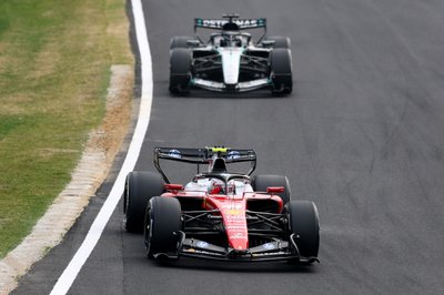 SUZUKA, JAPAN - MARCH 29: Lewis Hamilton of Great Britain driving the (44) Scuderia Ferrari SF-26 leads George Russell of Great Britain driving the (63) Mercedes AMG Petronas F1 Team W17 on track during the F1 Grand Prix of Japan at Suzuka Circuit on March 29, 2026 in Suzuka, Japan. (Photo by Clive Mason/Getty Images)