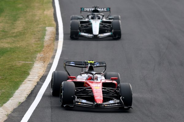 SUZUKA, JAPAN - MARCH 29: Lewis Hamilton of Great Britain driving the (44) Scuderia Ferrari SF-26 leads George Russell of Great Britain driving the (63) Mercedes AMG Petronas F1 Team W17 on track during the F1 Grand Prix of Japan at Suzuka Circuit on March 29, 2026 in Suzuka, Japan. (Photo by Clive Mason/Getty Images)