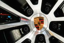 NEW YORK, NEW YORK - APRIL 02: The logo of car manufacturer Porsche is seen on the wheel rim at the New York Auto Show media day at the Jacob K. Javits Convention Center on April 02, 2026 in New York City. The 126th New York International Auto Show will have over 30 automotive manufacturers and around 700 cars, trucks and SUVs from mainstream, luxury and supercar brands. (Photo by Zamek/VIEWpress)