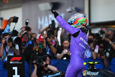 MIAMI, FLORIDA - MAY 02: Pole position qualifier Andrea Kimi Antonelli of Italy and Mercedes AMG Petronas F1 Team celebrates in parc ferme during qualifying ahead of the F1 Grand Prix of Miami at Miami International Autodrome on May 02, 2026 in Miami, Florida. (Photo by Rudy Carezzevoli/Getty Images)