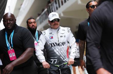 MIAMI, FLORIDA - MAY 03: Valtteri Bottas of Finland and Cadillac F1 Team on a scooter in the Paddock prior to the F1 Grand Prix of Miami at Miami International Autodrome on May 03, 2026 in Miami, Florida. (Photo by Sona Maleterova/LAT Images)