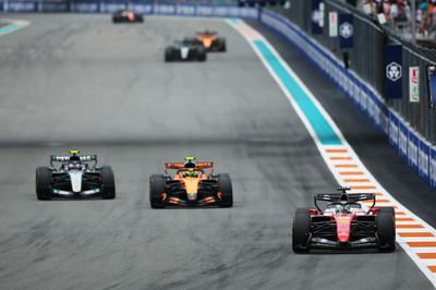 MIAMI, FLORIDA - MAY 03: Charles Leclerc of Monaco driving the (16) Scuderia Ferrari SF-26 leads Lando Norris of Great Britain driving the (1) McLaren MCL40 Mercedes and Andrea Kimi Antonelli of Italy driving the (12) Mercedes AMG Petronas F1 Team W17 on track during the F1 Grand Prix of Miami at Miami International Autodrome on May 03, 2026 in Miami, Florida. (Photo by Hector Vivas - Formula 1/Formula 1 via Getty Images)
