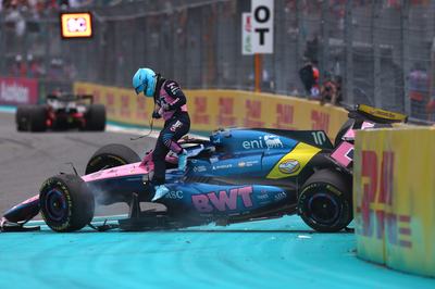 MIAMI, FLORIDA - MAY 03: Pierre Gasly of France driving the (10) Alpine F1 A526 Mercedes climbs out of his car after a crash during the F1 Grand Prix of Miami at Miami International Autodrome on May 03, 2026 in Miami, Florida. (Photo by Andy Hone/LAT Images)