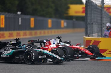MIAMI, FLORIDA - MAY 03: George Russell of Great Britain driving the (63) Mercedes AMG Petronas F1 Team W17 and Charles Leclerc of Monaco driving the (16) Scuderia Ferrari SF-26 battle for track position during the F1 Grand Prix of Miami at Miami International Autodrome on May 03, 2026 in Miami, Florida. (Photo by Andy Hone/LAT Images)