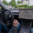 11 May 2026, Rhineland-Palatinate, Bitburg: A self-driving Tesla Model Y is on the road autonomously in Bitburg (Eifel). A factory driver sitting at the wheel intervenes as required in the "Full Self-Driving" (FSD/Supervised) software update, which is not yet approved nationwide. Photo: Harald Tittel/dpa (Photo by Harald Tittel/picture alliance via Getty Images)