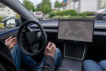 11 May 2026, Rhineland-Palatinate, Bitburg: A self-driving Tesla Model Y is on the road autonomously in Bitburg (Eifel). A factory driver sitting at the wheel intervenes as required in the "Full Self-Driving" (FSD/Supervised) software update, which is not yet approved nationwide. Photo: Harald Tittel/dpa (Photo by Harald Tittel/picture alliance via Getty Images)