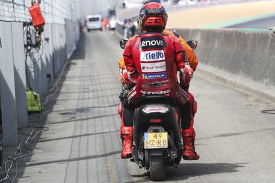 LE MANS, FRANCE - MAY 09: Marc Marquez of Spain riding the Lenovo Ducati (93) is taken back to the paddock after crashing during the Sprint ahead of the MotoGP of France at Circuit Bugatti on May 09, 2026 in Le Mans, France. (Photo by Gold & Goose Photography/Getty Images)