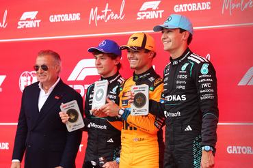 MONTREAL, QUEBEC - MAY 23: Sprint winner George Russell of Great Britain and Mercedes AMG Petronas F1 Team Second placed Lando Norris of Great Britain and McLaren and Third placed Andrea Kimi Antonelli of Italy and Mercedes AMG Petronas F1 Team receive their Sprint trophies from Jean Alesi during the Sprint ahead of the F1 Grand Prix of Canada at Circuit Gilles-Villeneuve on May 23, 2026 in Montreal, Quebec. (Photo by Alastair Staley/LAT Images)