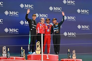 BARCELONA, SPAIN - JUNE 14: Race winner Lewis Hamilton of Great Britain and Scuderia Ferrari Second placed George Russell of Great Britain and Mercedes AMG Petronas F1 Team Third placed Lando Norris of Great Britain and McLaren and Carlo Santi, Race Engineer at Ferrari on the podium during the F1 Grand Prix of Barcelona-Catalunya at Circuit de Barcelona-Catalunya on June 14, 2026 in Barcelona, Spain. (Photo by Mark Sutton - Formula 1/Formula 1 via Getty Images)