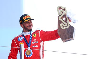 BARCELONA, SPAIN - JUNE 14: Race winner Lewis Hamilton of Great Britain and Scuderia Ferrari leaves the podium with his trophy during the F1 Grand Prix of Barcelona-Catalunya at Circuit de Barcelona-Catalunya on June 14, 2026 in Barcelona, Spain. (Photo by Clive Mason/Getty Images)