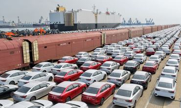 MG sedans are waiting to be loaded onto a ship for export at Yantai Port in Yantai City, Shandong Province, China, on June 18, 2026. (Photo by Costfoto/NurPhoto via Getty Images)