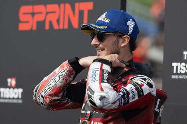 BRNO, CZECH REPUBLIC - JUNE 20: Francesco Bagnaia of Italy and Ducati Lenovo Team celebrates the victory on the podium on track at the end of the MotoGP™ Tissot Sprint race during the Sprint/qualifying ahead of the MotoGP of  Czechia at Brno Circuit on June 20, 2026 in Brno, Czech Republic. (Photo by Mirco Lazzari gp/Getty Images)