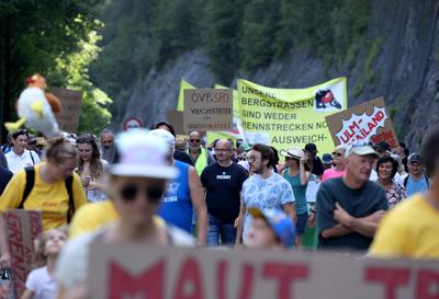 27 June 2026, Austria, Reutte: Protesters are marching in a demonstration along the closed B179 Fernpass Road toward a rally. Photo: Karl-Josef Hildenbrand/dpa (Photo by Karl-Josef Hildenbrand/picture alliance via Getty Images)