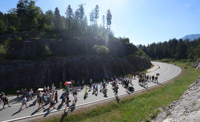 27 June 2026, Austria, Reutte: Protesters are marching in a demonstration along the closed B179 Fernpass Road toward a rally. Photo: Karl-Josef Hildenbrand/dpa (Photo by Karl-Josef Hildenbrand/picture alliance via Getty Images)