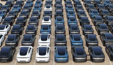 An IM5 electric vehicle waits to be shipped for export at a car yard in Yantai, Shandong, China, on July 3, 2026. (Photo by Costfoto/NurPhoto via Getty Images)