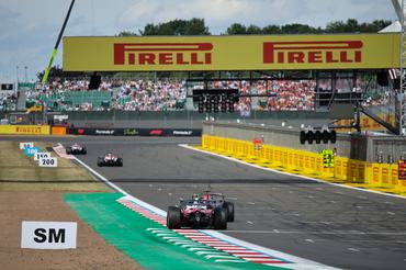 Max Verstappen of the Netherlands driving the (3) Oracle Red Bull Racing RB22 Ford RBPT and Lewis Hamilton of the United Kingdom driving the (44) Scuderia Ferrari HP SF-26 Ferrari during the Formula 1 Pirelli British Grand Prix 2026 at Circuit of Silverstone in Silverstone on July 5, 2026. (Photo by Paul Foster/Alessio Morgese/NurPhoto via Getty Images)