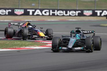 SILVERSTONE, TOWCESTER, UNITED KINGDOM - 2026/07/05: George Russell of Mercedes AMG Petronas F1 Team and Max Verstappen of Oracle Red Bull Racing seen during the Formula 1 Pirelli British Grand Prix at Silverstone circuit. Final result Winner - Charles Leclerc, Ferrari, 2nd position - George Russell, Mercedes, 3rd position - Lewis Hamilton, Ferrari. (Photo by Paul Bonser/SOPA Images/LightRocket via Getty Images)