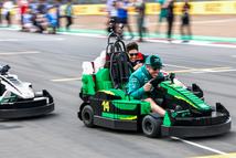 NORTHAMPTON, ENGLAND - JULY 05: Fernando Alonso of Spain and Aston Martin F1 Team drives a Lego Minicar on the drivers parade prior to the F1 Grand Prix of Great Britain at Silverstone Circuit on July 05, 2026 in Northampton, England. (Photo by Peter Fox/Getty Images)