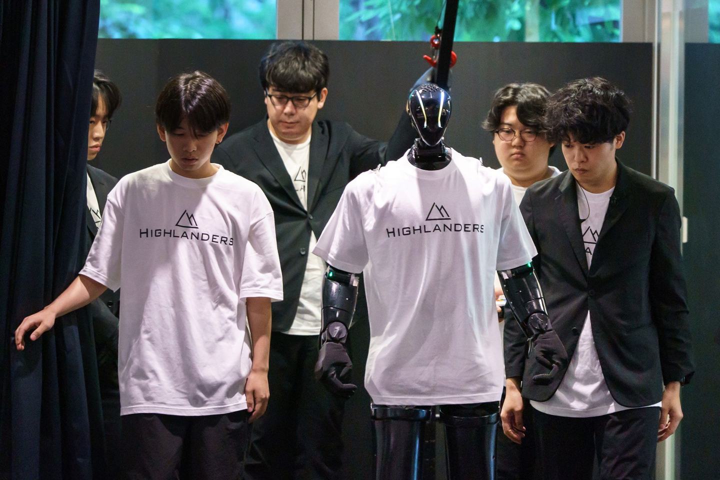 TOKYO, JAPAN - JULY 09: A humanoid robot named N, manufactured by Highlanders Inc., is demonstrated at the Mitsubishi Motors Corp. headquarters on July 09, 2026, in Tokyo, Japan. Mitsubishi Motors and Highlanders unveiled a prototype of a humanoid robot capable of transporting automobile parts and assembling engines on a production line. The robot is scheduled to enter mass production in Japan in 2027. (Photo by Tomohiro Ohsumi/Getty Images)