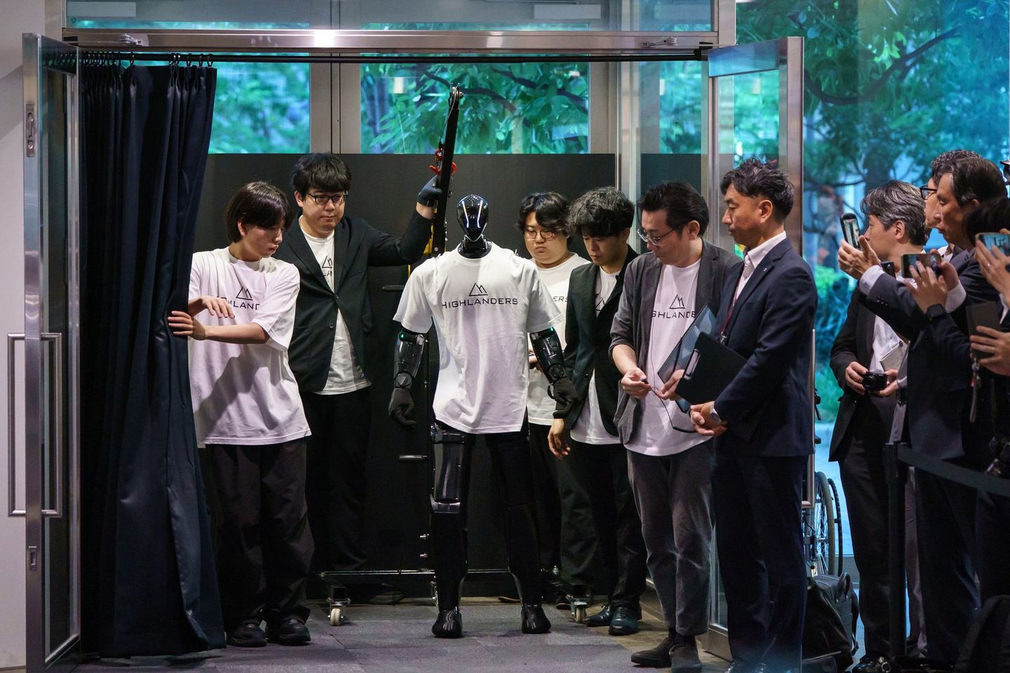 TOKYO, JAPAN - JULY 09:  A humanoid robot named N, manufactured by Highlanders Inc., is demonstrated at the Mitsubishi Motors Corp. headquarters on July 09, 2026, in Tokyo, Japan. Mitsubishi Motors and Highlanders unveiled a prototype of a humanoid robot capable of transporting automobile parts and assembling engines on a production line. The robot is scheduled to enter mass production in Japan in 2027. (Photo by Tomohiro Ohsumi/Getty Images)