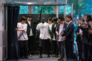 TOKYO, JAPAN - JULY 09:  A humanoid robot named N, manufactured by Highlanders Inc., is demonstrated at the Mitsubishi Motors Corp. headquarters on July 09, 2026, in Tokyo, Japan. Mitsubishi Motors and Highlanders unveiled a prototype of a humanoid robot capable of transporting automobile parts and assembling engines on a production line. The robot is scheduled to enter mass production in Japan in 2027. (Photo by Tomohiro Ohsumi/Getty Images)
